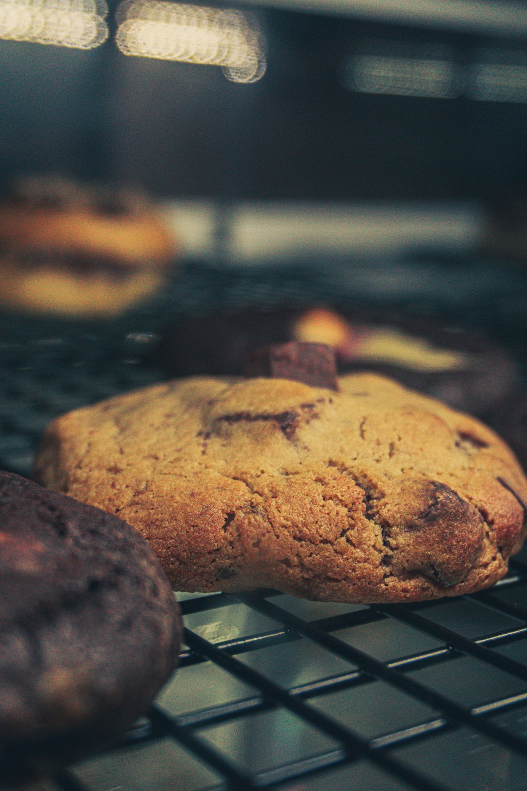 a close up of cookies on a cooling rack